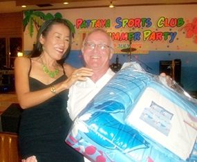 PSC President Tony Oakes gets some help with the raffle prizes.